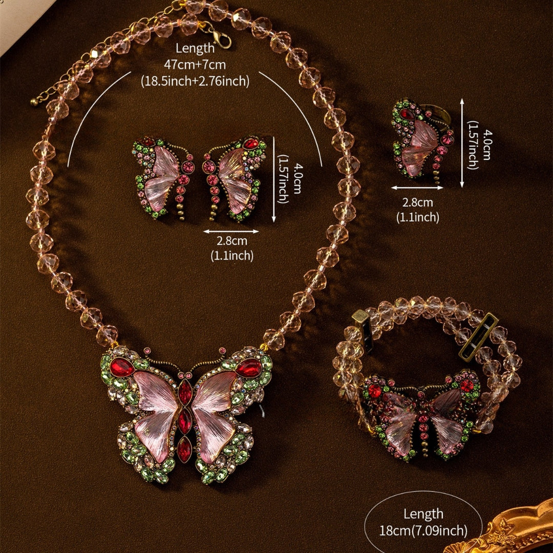 Butterfly-themed jewelry set with necklace, earrings, and bracelet