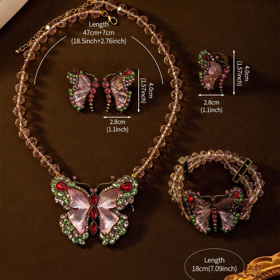 Butterfly-themed jewelry set with necklace, earrings, and bracelet
