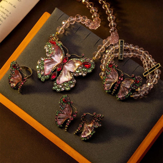 Vintage Rococo Butterfly-themed jewelry set including ring, earrings, and bracelet