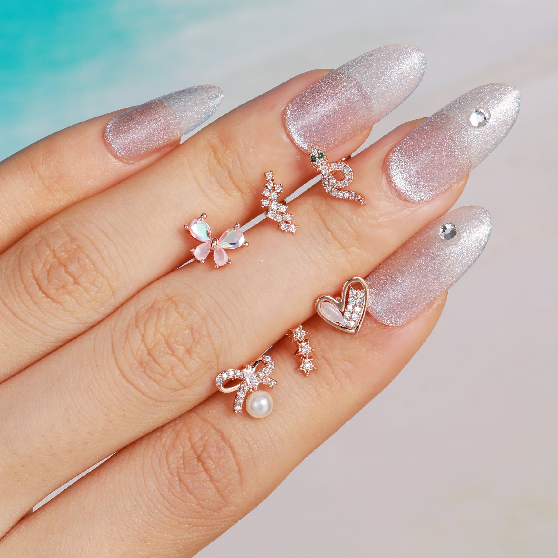 cartilage earrings, piercing jewelry, cartilage piercing, body jewelry, helix piercing, helix earrings, tragus piercing, flower earrings, snake earrings, bowknot earrings, butterfly earrings