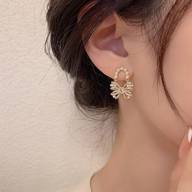 Gleaming CZ Pearl Ribbon Earrings