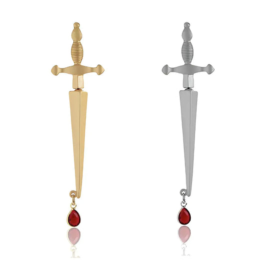 Gold and silver sword-shaped ear jacket earrings with red gemstones