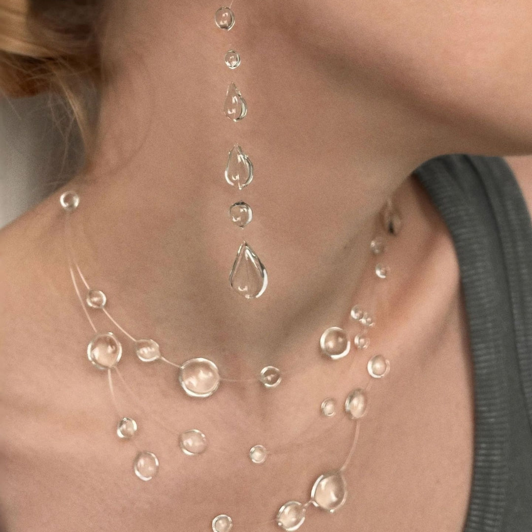 transparent dewdrop earrings and layering necklace clear color