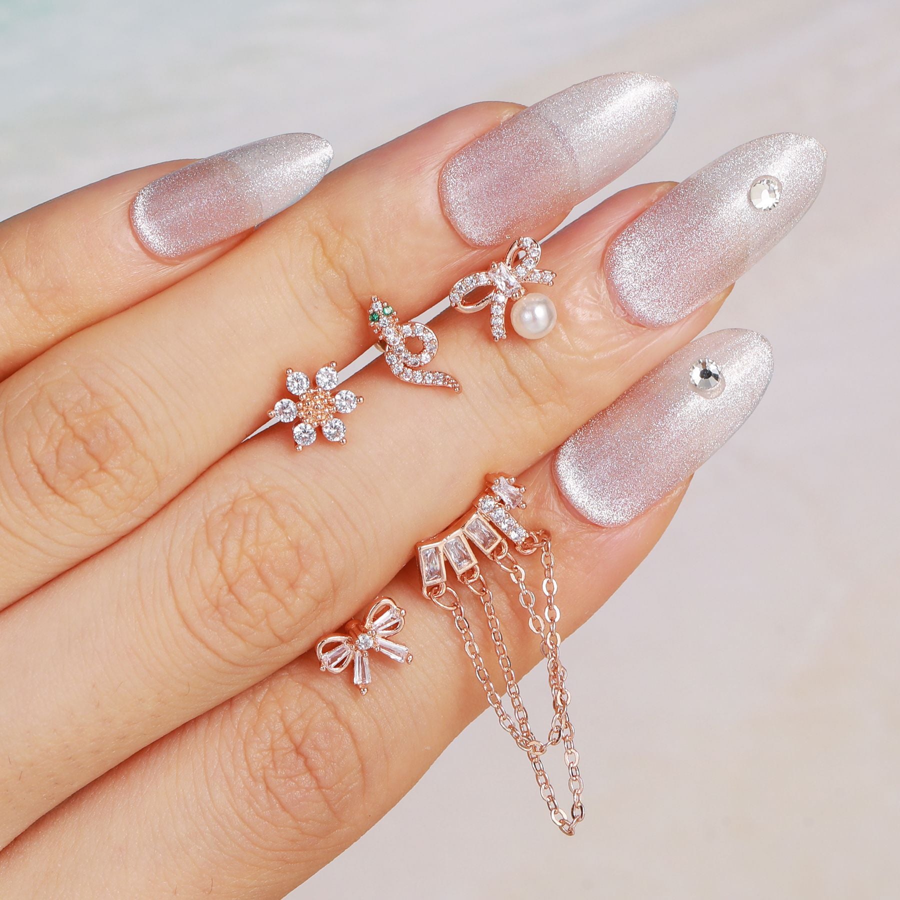 cartilage earrings, piercing jewelry, cartilage piercing, body jewelry, helix piercing, helix earrings, tragus piercing, flower earrings, snake earrings, bowknot earrings, butterfly earrings