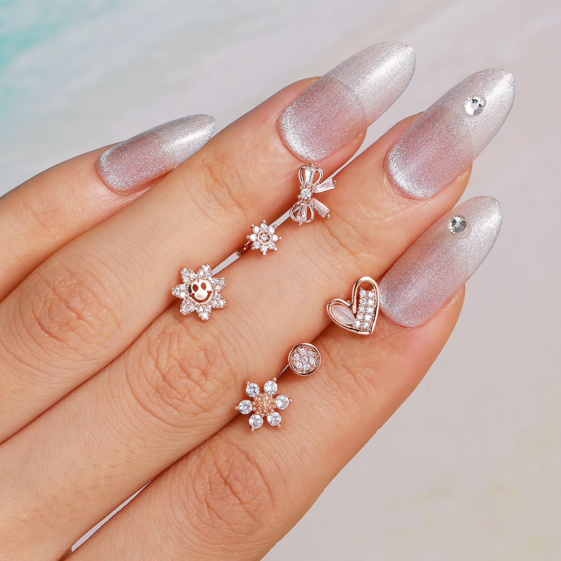 cartilage earrings, piercing jewelry, cartilage piercing, body jewelry, helix piercing, helix earrings, tragus piercing, flower earrings, snake earrings, bowknot earrings, butterfly earrings