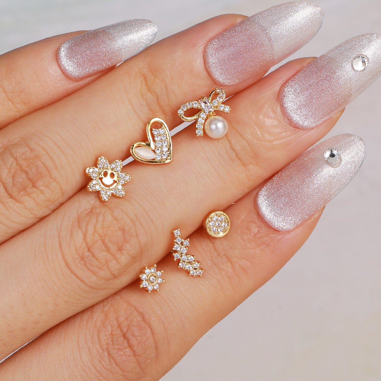 cartilage earrings, piercing jewelry, cartilage piercing, body jewelry, helix piercing, helix earrings, tragus piercing, flower earrings, snake earrings, bowknot earrings, butterfly earrings