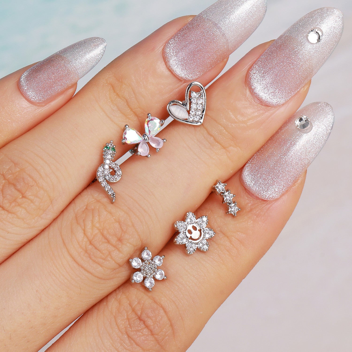 cartilage earrings, piercing jewelry, cartilage piercing, body jewelry, helix piercing, helix earrings, tragus piercing, flower earrings, snake earrings, bowknot earrings, butterfly earrings