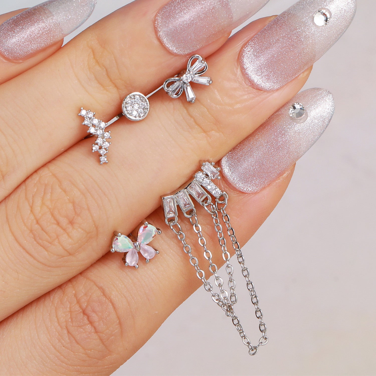 cartilage earrings, piercing jewelry, cartilage piercing, body jewelry, helix piercing, helix earrings, tragus piercing, flower earrings, snake earrings, bowknot earrings, butterfly earrings