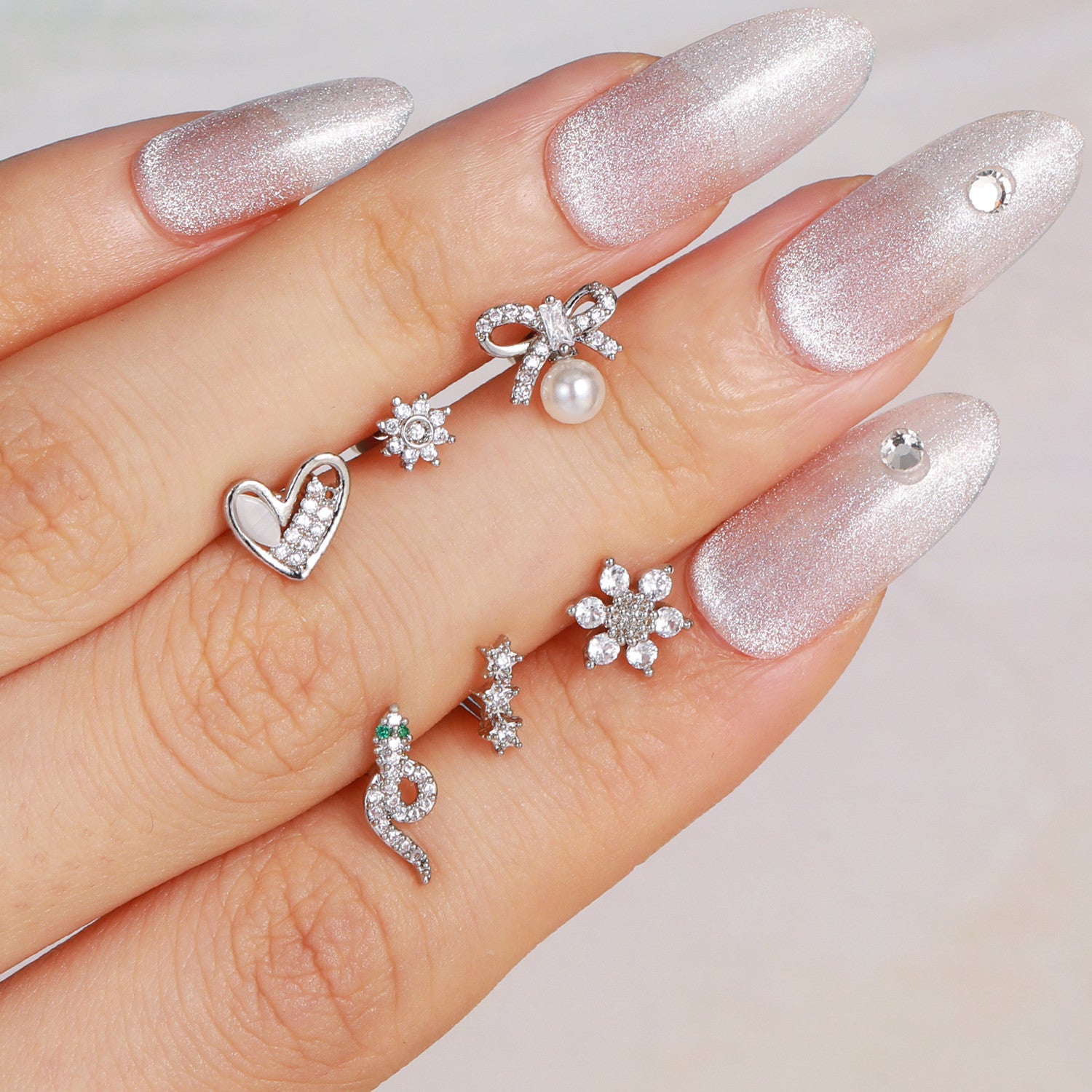 cartilage earrings, piercing jewelry, cartilage piercing, body jewelry, helix piercing, helix earrings, tragus piercing, flower earrings, snake earrings, bowknot earrings, butterfly earrings