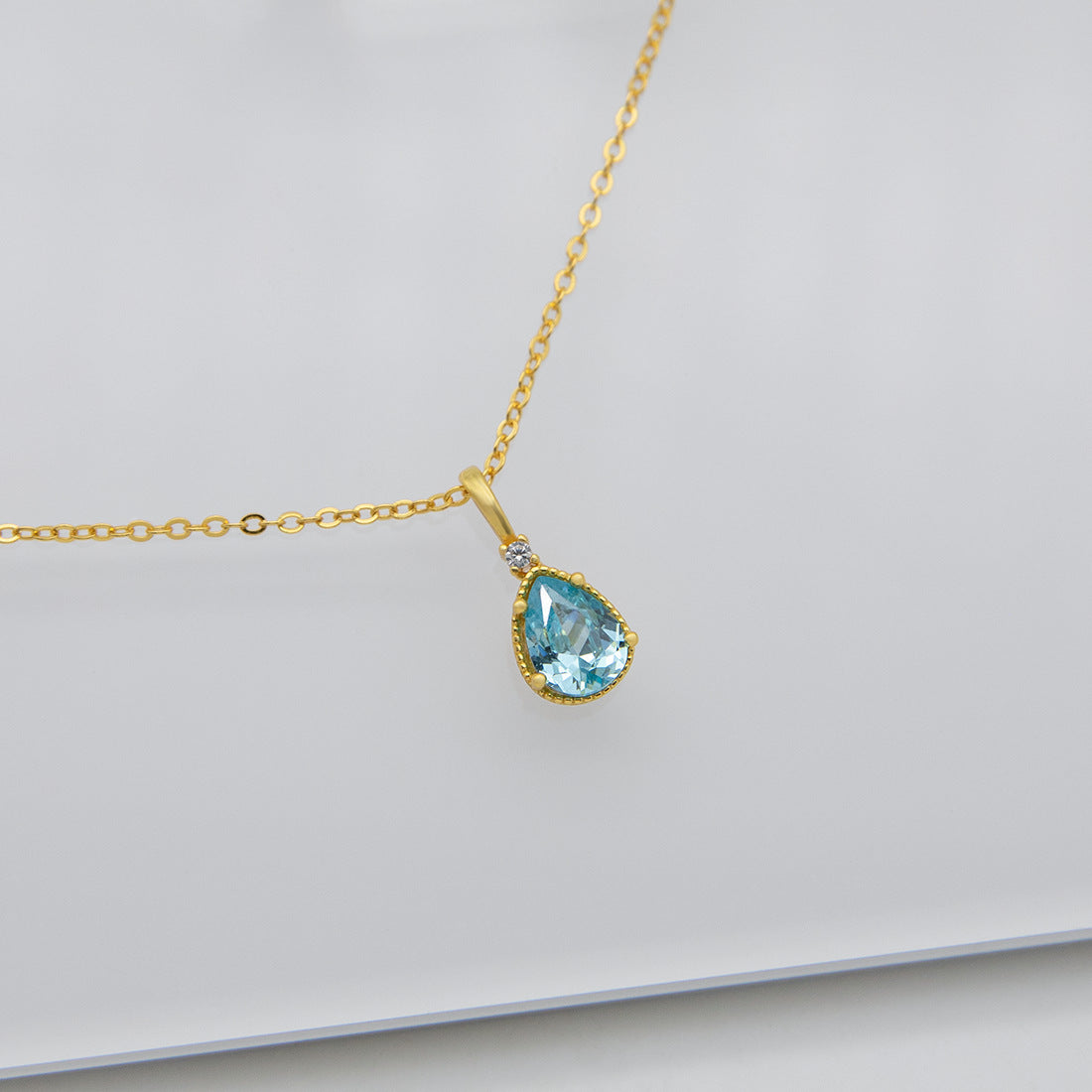 Gold Blue Topaz Teardrop Necklace