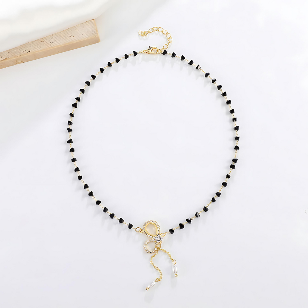 Gold Crystal Bow Pearl Y Necklace