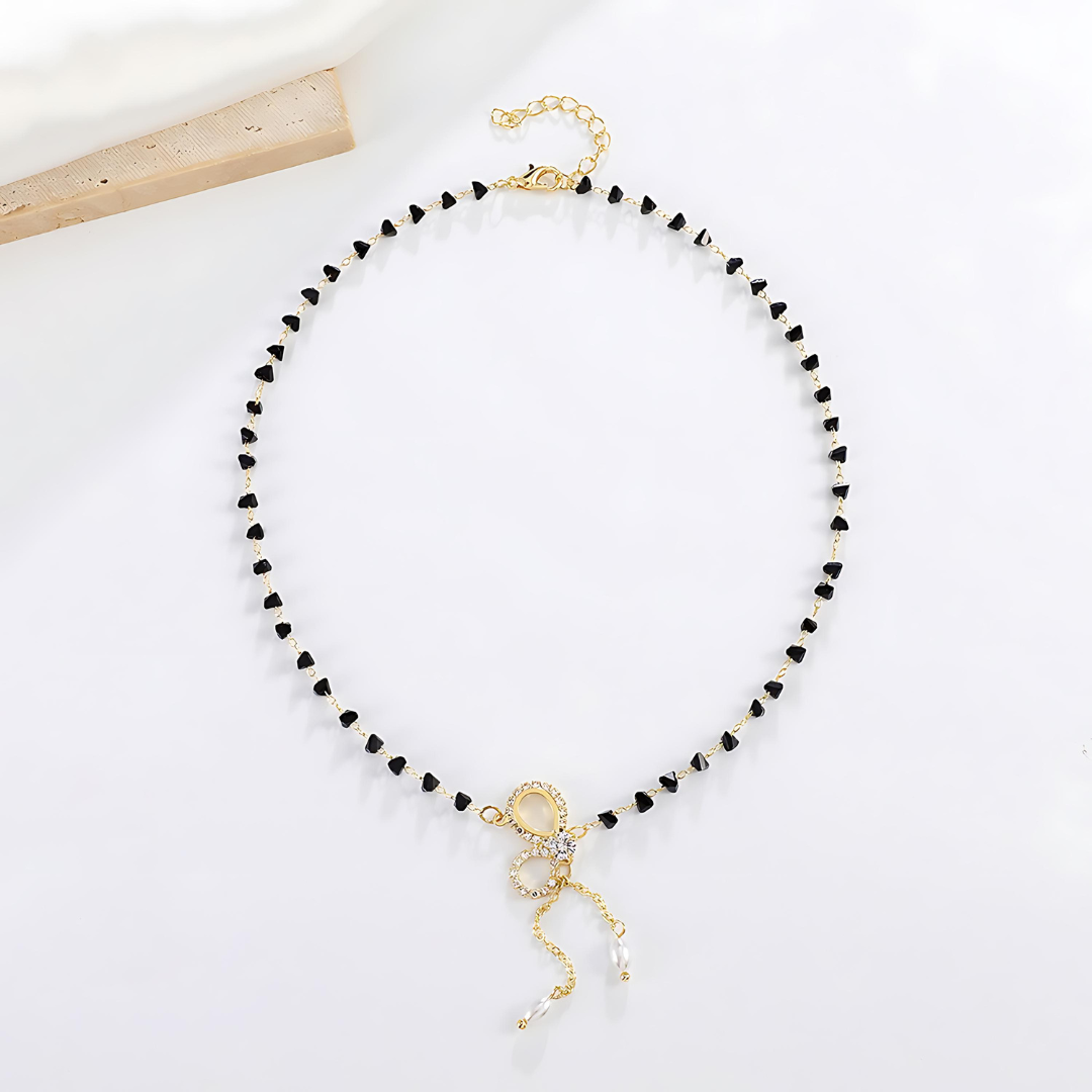 Gold Crystal Bow Pearl Y Necklace