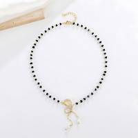 Gold Crystal Bow Pearl Y Necklace