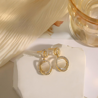 Gold Eyes Stone Diamond Earrings