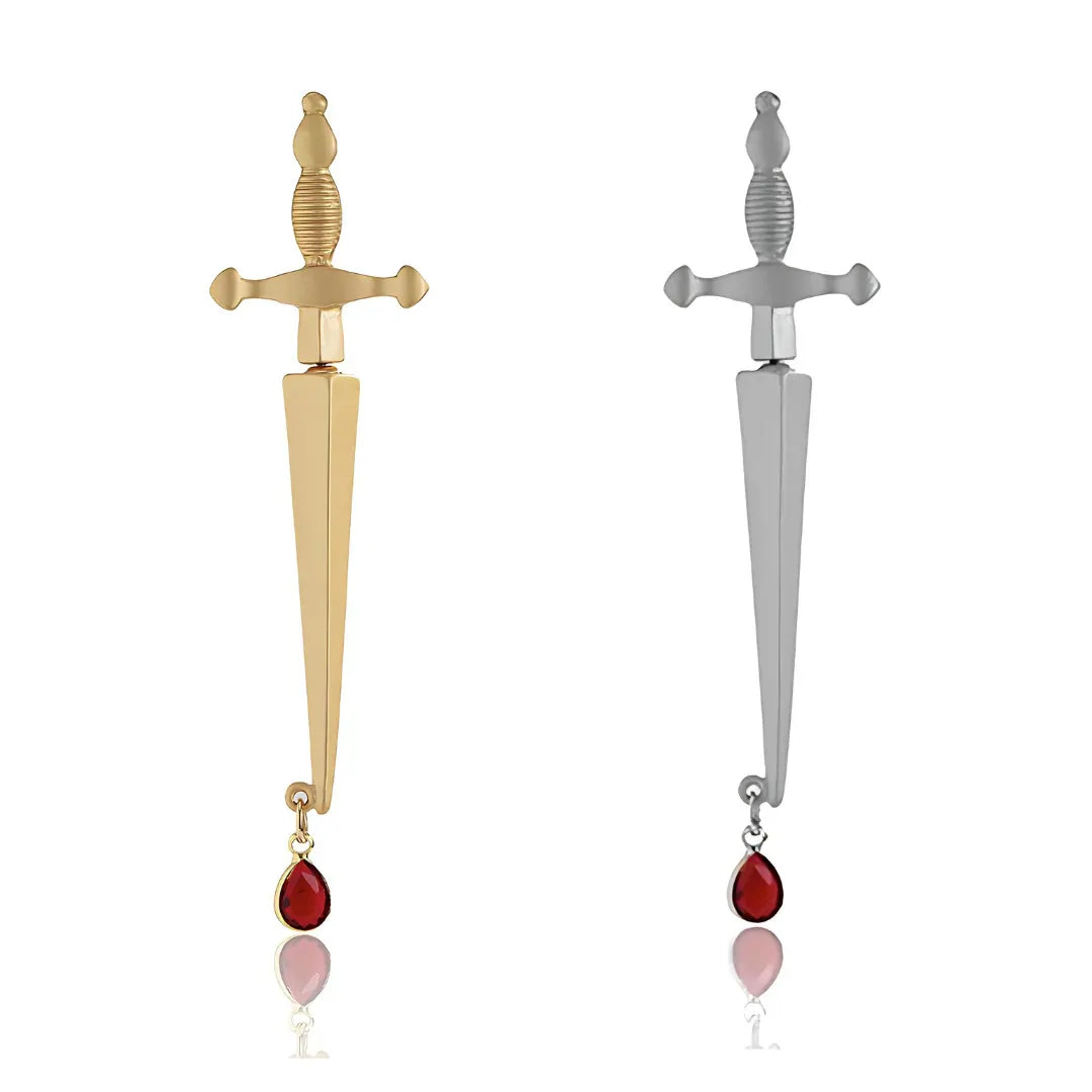 Gold and silver sword-shaped ear jacket earrings with red gemstones 