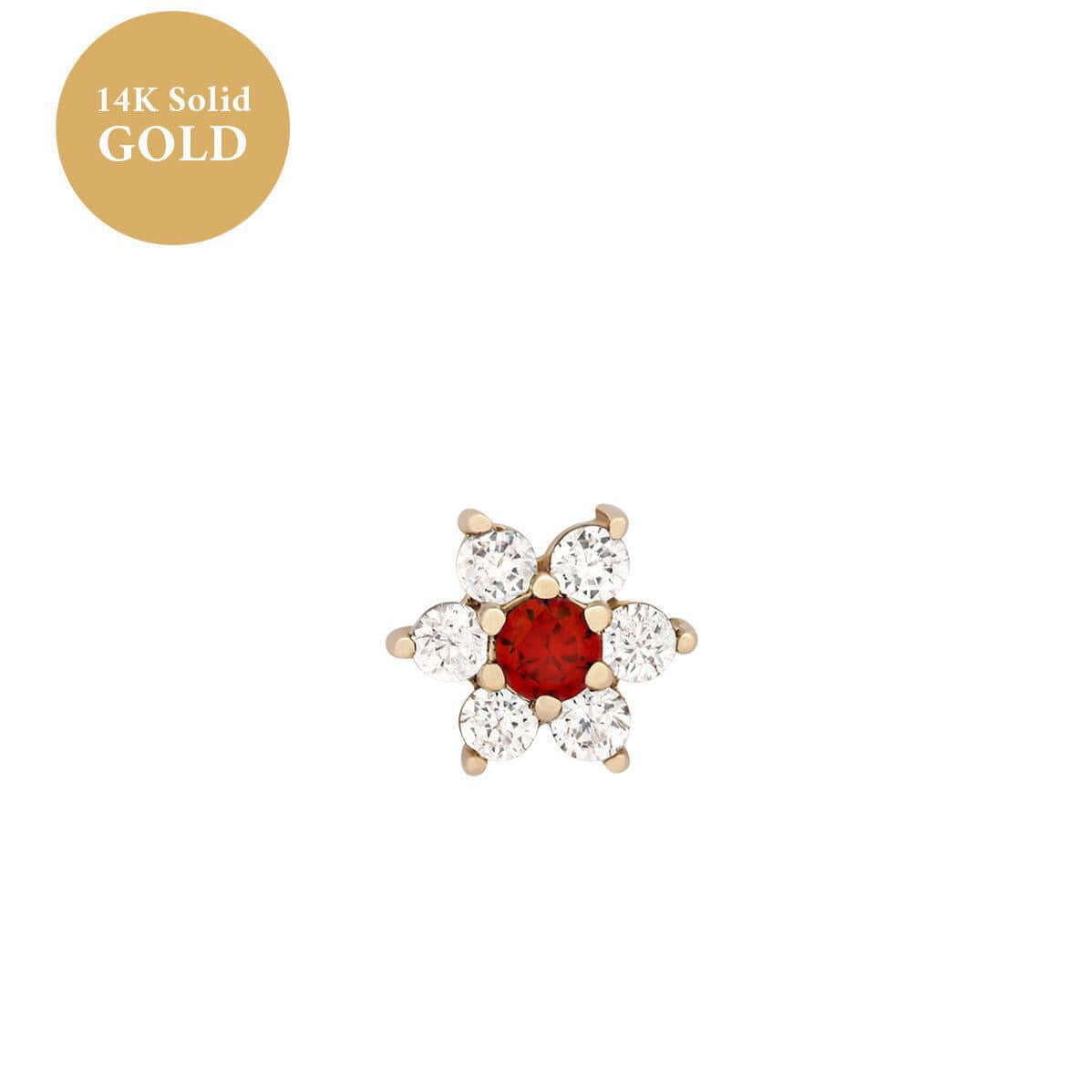 14K gold floral birthstone cartilage earring with a red center stone and white surrounding stones.