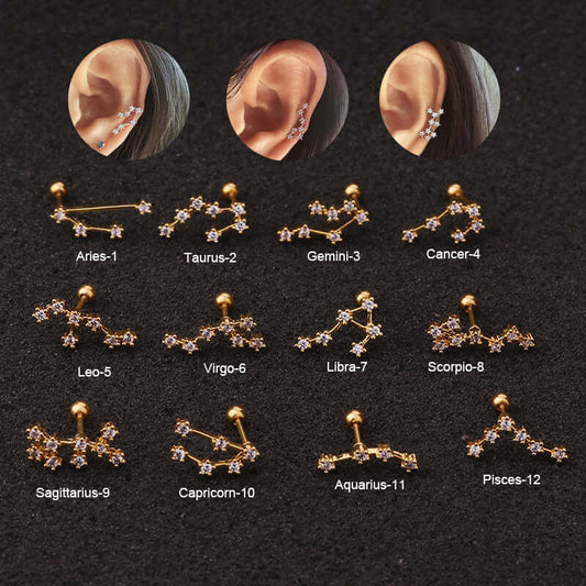 Zodiac cartilage earrings in various constellation designs for Aries, Taurus, Gemini, Cancer, Leo, Virgo, Libra, Scorpio, Sagittarius, Capricorn, Aquarius, and Pisces.