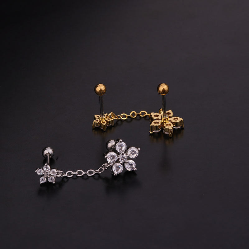 Silver and gold cartilage dangle earrings with floral pattern, featuring CZ crystals, suitable for helix and tragus piercings.