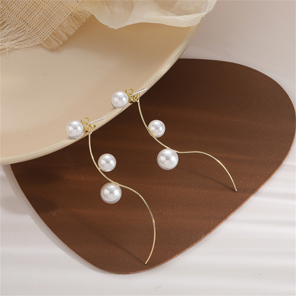 Classic Curve Pearl Long Earrings