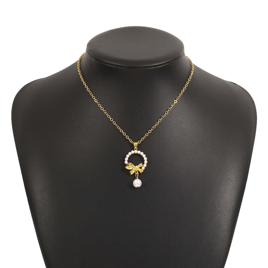 Feminine Pearl Bow Pendant Necklace
