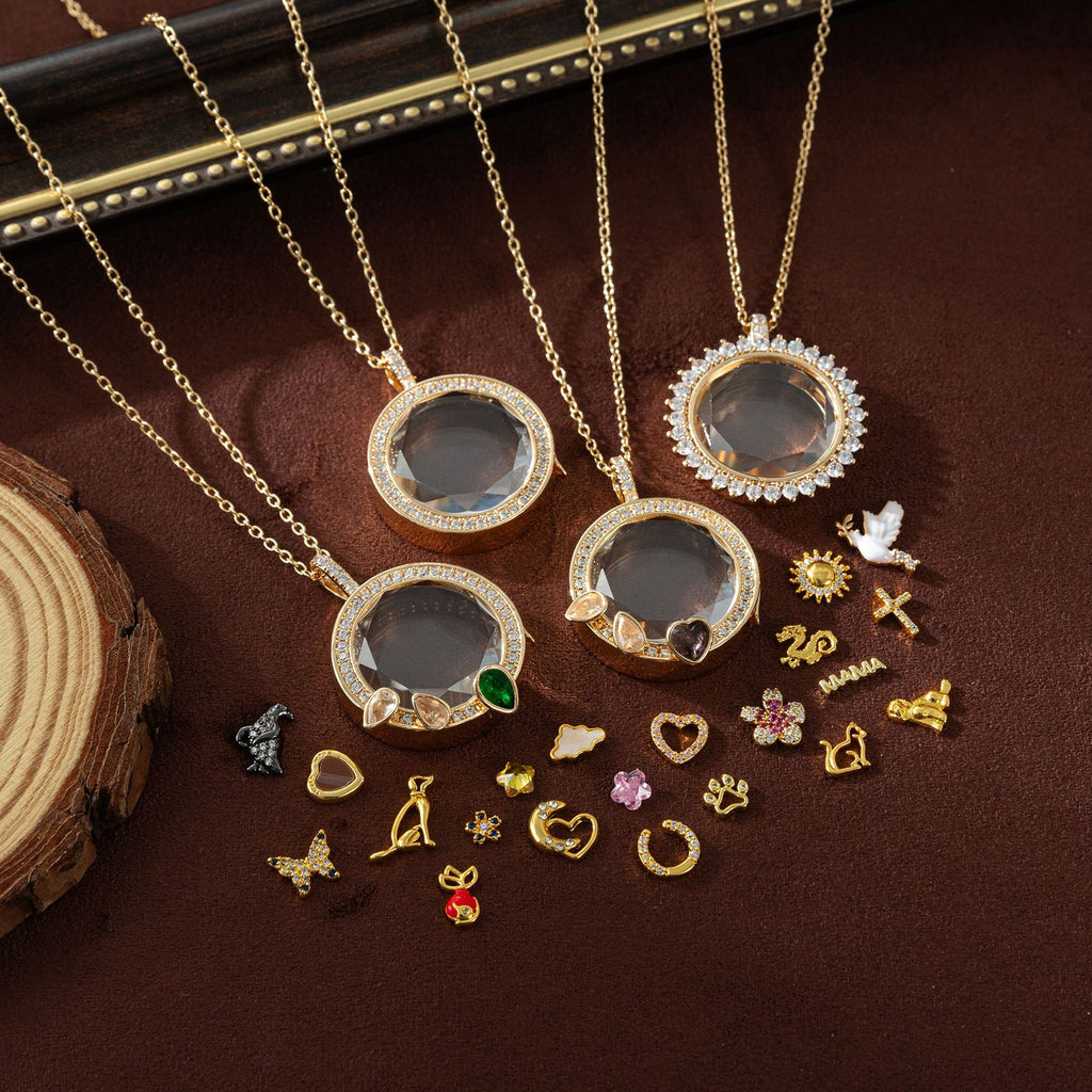 Three gold necklaces with circular pendants on a brown surface with additional pendants.