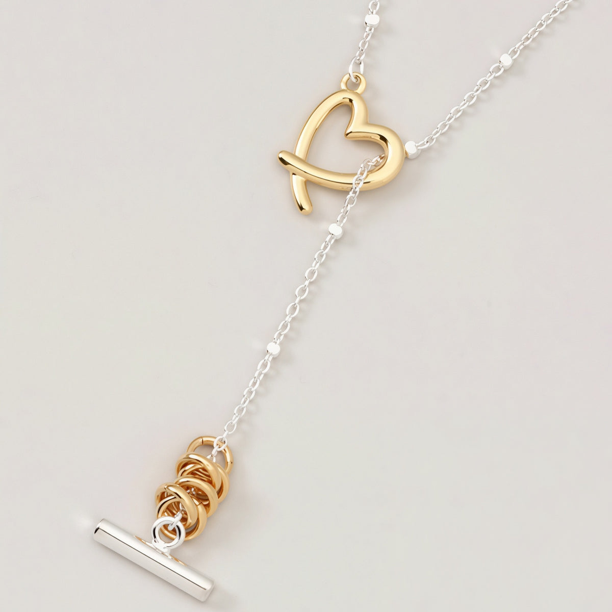 Two-Tone Love Knot Heart Lariat Necklace