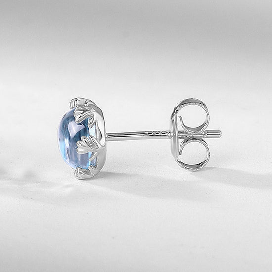 Moonlit Bloom Blue Topaz Flower Stud Earrings