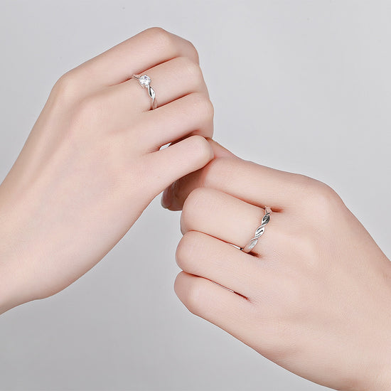 A couple wearing Silver Twist Couple Band Rings