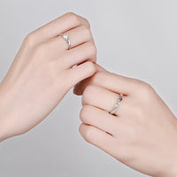 A couple wearing Silver Twist Couple Band Rings