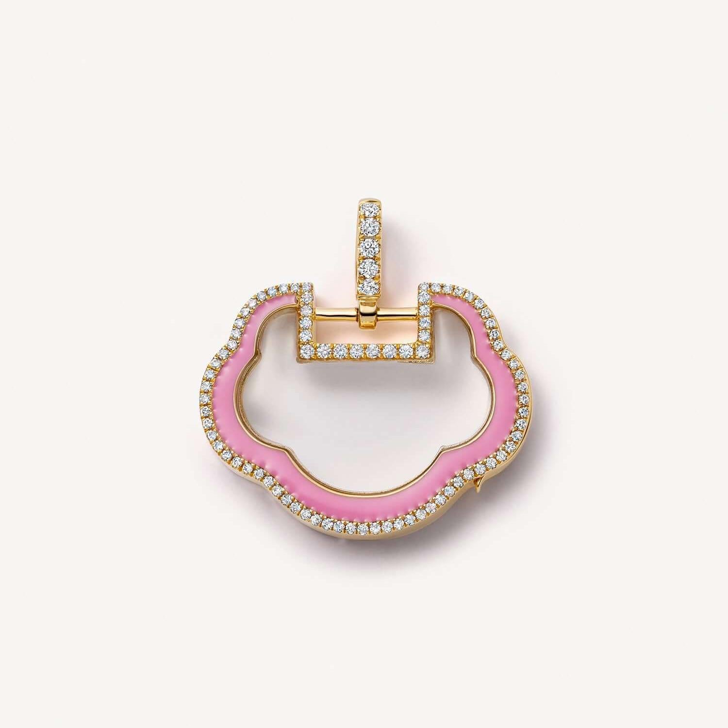 Pink enamel and gold pendant on a white background