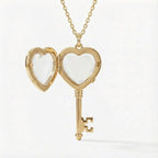 Gold heart-shaped key locket on a white background