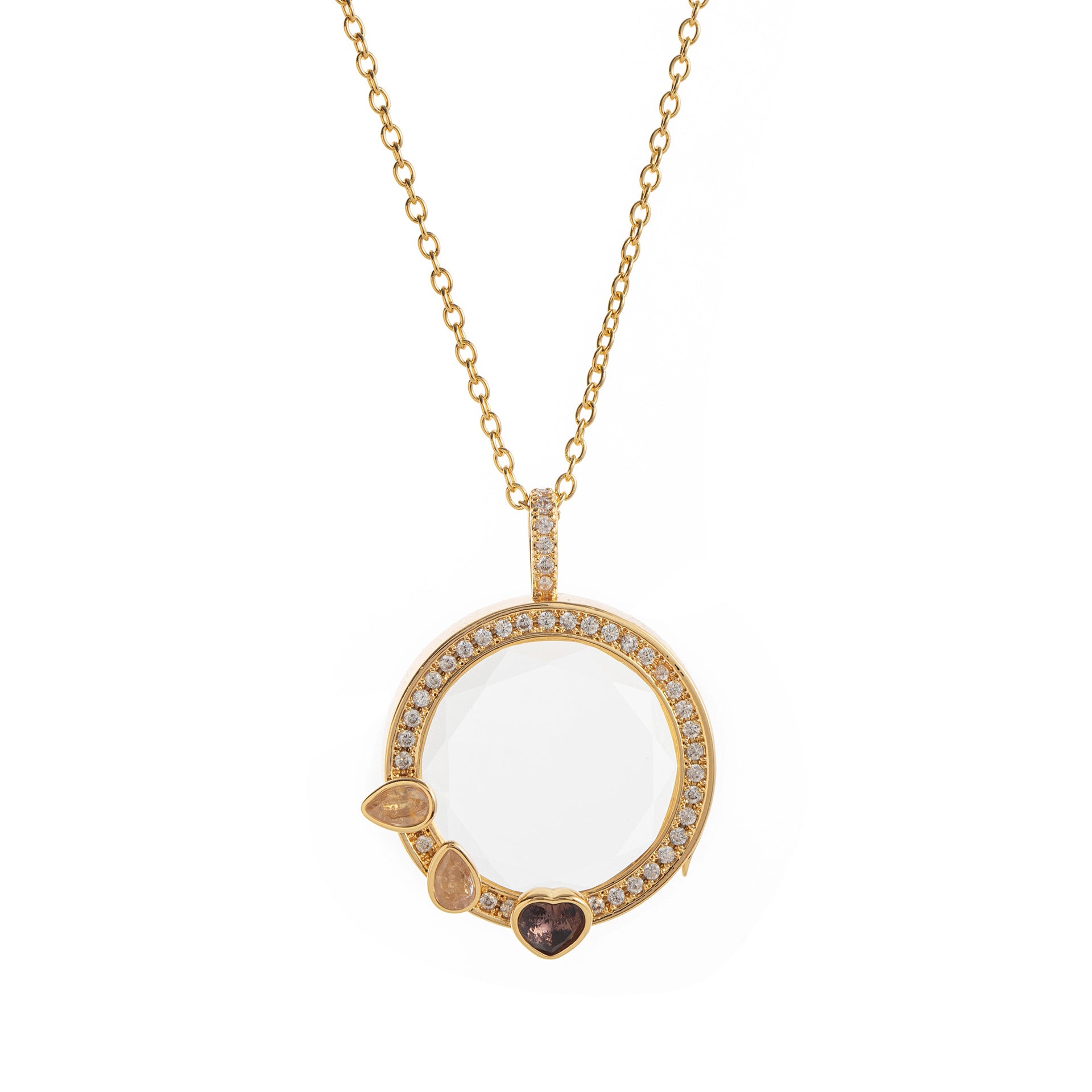 Gold necklace with a round pendant featuring gemstones on a white background