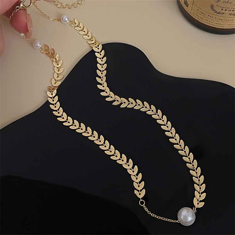 Opulent Gold Leaf Pearl Necklace