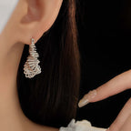 Opulent Silver Spiral Triangle Earrings