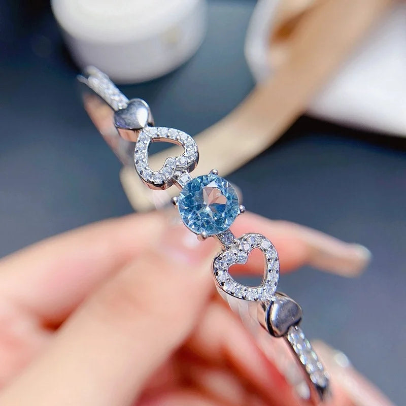 Platinum Blue Topaz Heart Bracelet