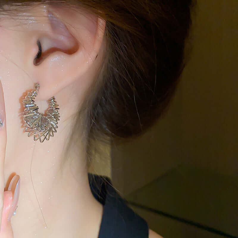 Radiant Silver Spiral Triangle Earrings