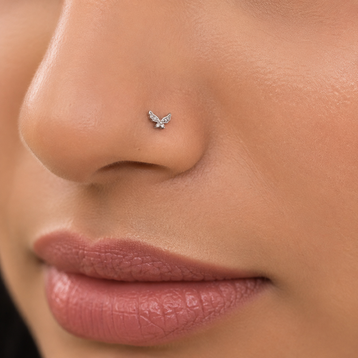 angel wing septum nose piercing