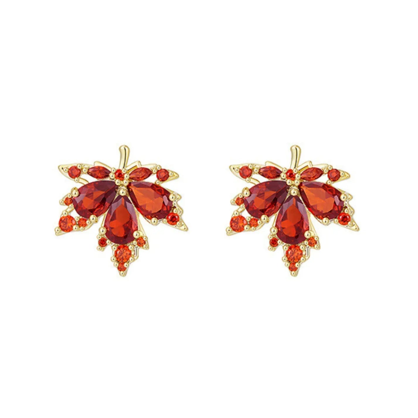 Pair of orange gemstone earrings with gold accents on a white background