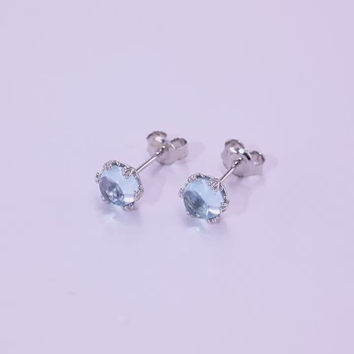 Moonlit Bloom Blue Topaz Flower Stud Earrings