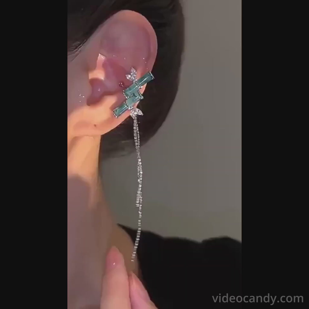  Introducing our Asian Lucky Bamboo Ear Cuff with Tassel | E3C07! This unique cool jewelry is nature inspired and features a bling zircon tassel and chain, perfect for styling up your look. No need for pierced ears - this bamboo ear cuff symbolizes good luck and wealth in Chinese culture.