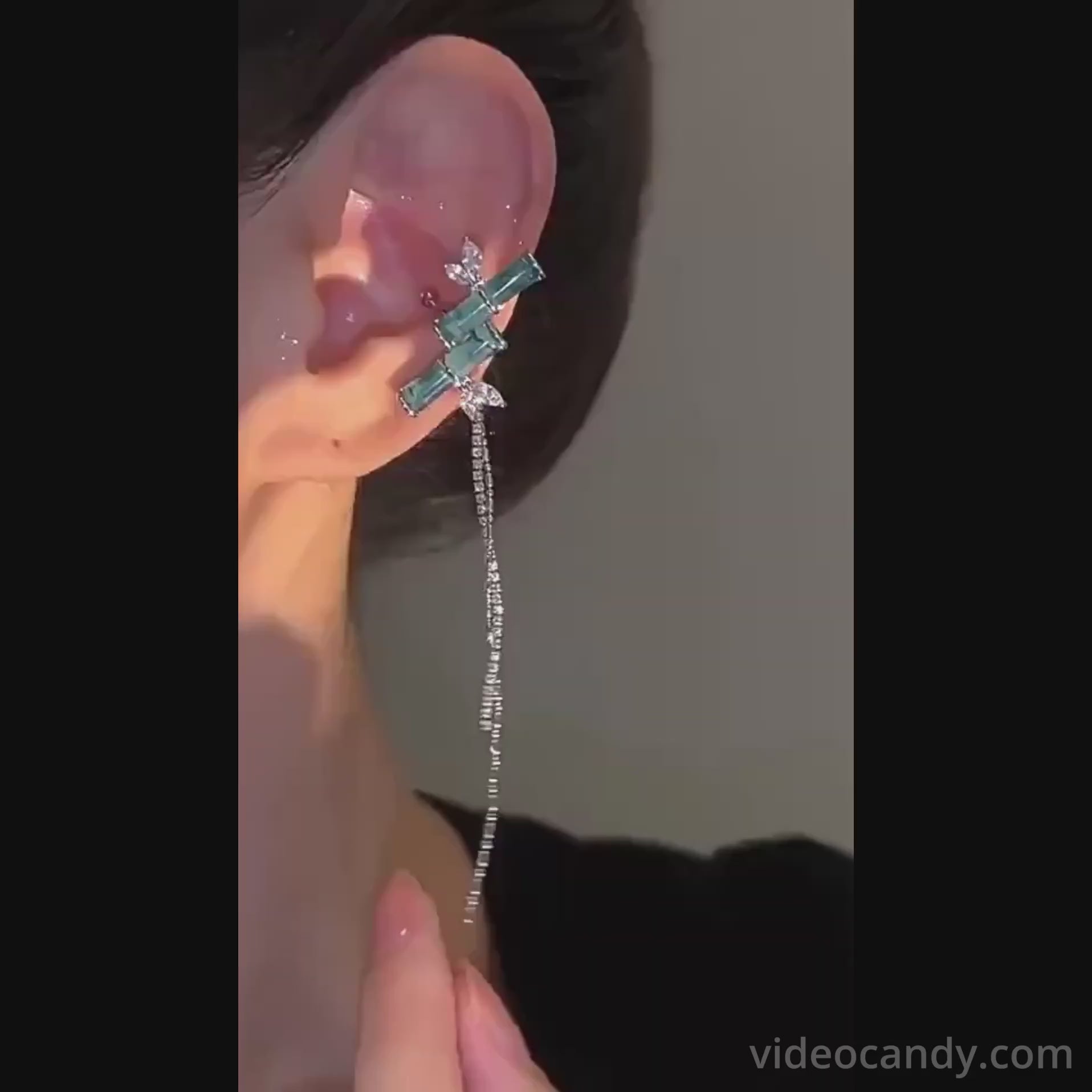  Introducing our Asian Lucky Bamboo Ear Cuff with Tassel | E3C07! This unique cool jewelry is nature inspired and features a bling zircon tassel and chain, perfect for styling up your look. No need for pierced ears - this bamboo ear cuff symbolizes good luck and wealth in Chinese culture.